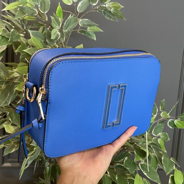 Set de Crossbody y Monedero Azul MJ
